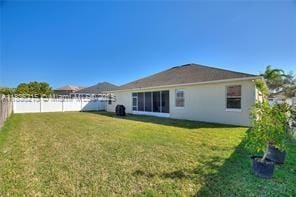 1851 Soaring Hights Cir, Orlando, FL 32837 - rear view of house featuring a fenced backyard