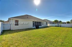 1851 Soaring Hights Cir, Orlando, FL 32837 - rear view of property with a fenced backyard