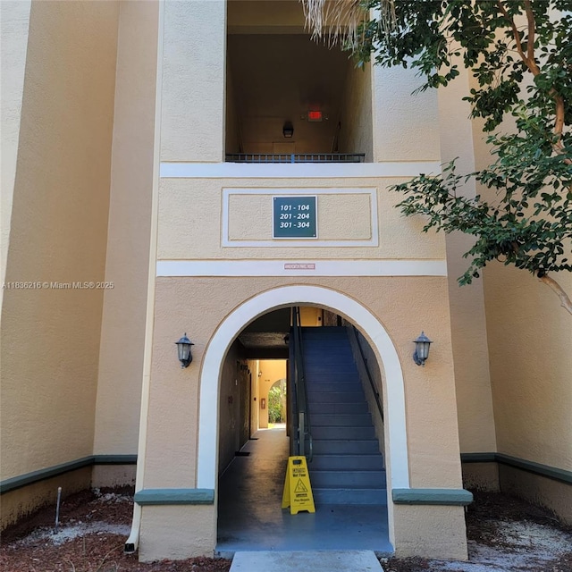 2564 Centergate Dr Unit 204, Miramar, FL 33025 - property entrance with stucco siding