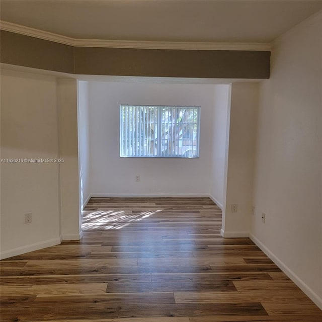 2564 Centergate Dr Unit 204, Miramar, FL 33025 - empty room with wood finished floors and crown molding