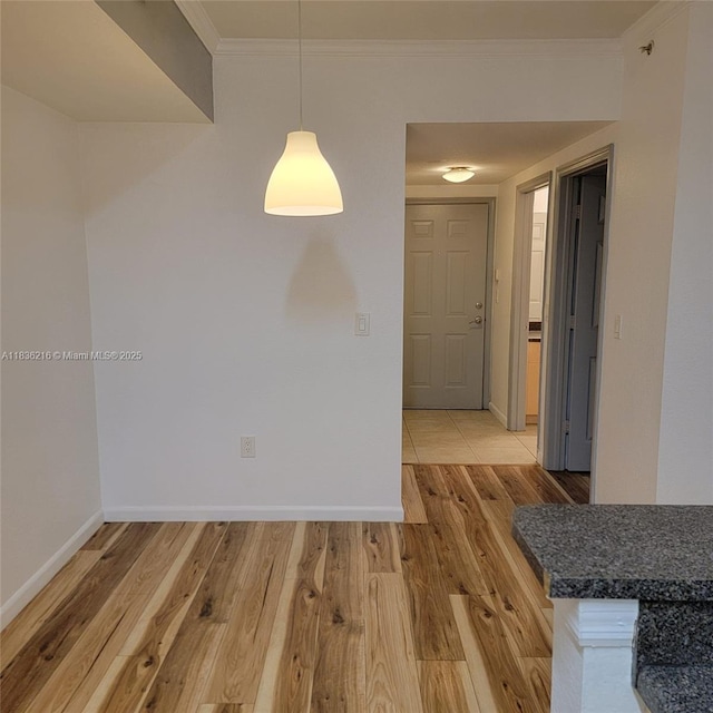 2564 Centergate Dr Unit 204, Miramar, FL 33025 - unfurnished dining area featuring ornamental molding and light wood-style floors
