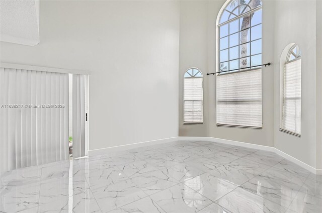 11652 SW 142nd Ct, Miami, FL 33186 - garage featuring baseboards