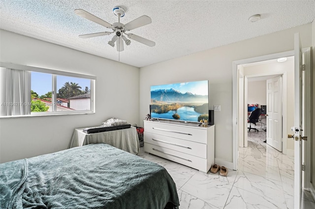 11652 SW 142nd Ct, Miami, FL 33186 - bedroom with light marble finish flooring, a textured ceiling, and ceiling fan