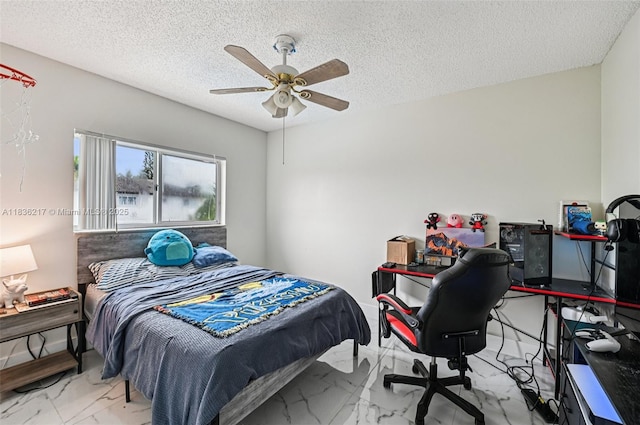 11652 SW 142nd Ct, Miami, FL 33186 - bedroom featuring marble finish flooring, a ceiling fan, an office area, and a textured ceiling