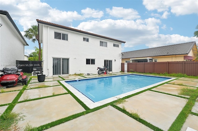 11652 SW 142nd Ct, Miami, FL 33186 - view of swimming pool with a patio