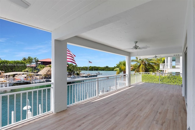 126 Villa Bella Dr, Islamorada, FL 33036 - deck with a water view and ceiling fan