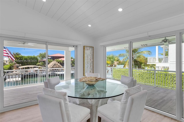 126 Villa Bella Dr, Islamorada, FL 33036 - sunroom featuring outdoor dining area, healthy amount of natural light, a water view, and ceiling fan