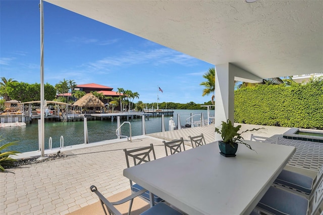 126 Villa Bella Dr, Islamorada, FL 33036 - view of patio / terrace with a dock and a water view