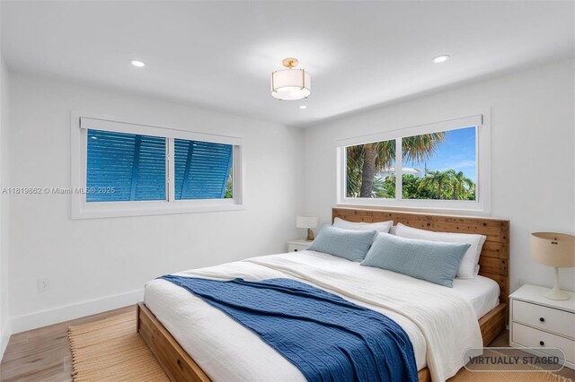 126 Villa Bella Dr, Islamorada, FL 33036 - bedroom featuring wood finished floors and recessed lighting
