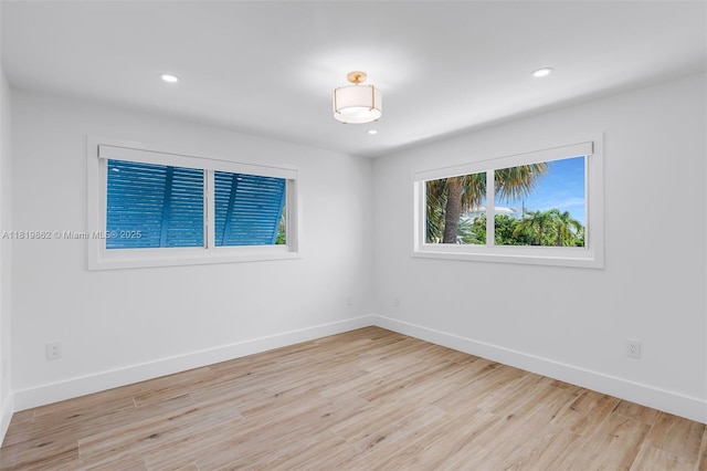 126 Villa Bella Dr, Islamorada, FL 33036 - empty room featuring wood finished floors and recessed lighting