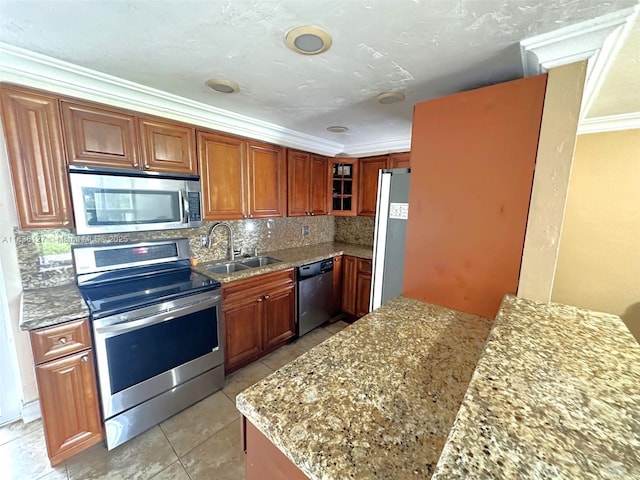 6707 Brookline Dr Unit 6707, Hialeah, FL 33015 - kitchen with appliances with stainless steel finishes, decorative backsplash, crown molding, glass insert cabinets, and light stone countertops