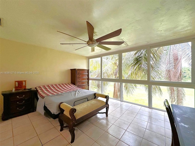 6707 Brookline Dr Unit 6707, Hialeah, FL 33015 - bedroom with light tile patterned floors and ceiling fan