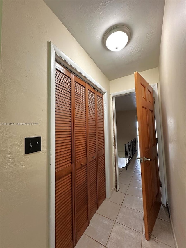 6707 Brookline Dr Unit 6707, Hialeah, FL 33015 - corridor featuring light tile patterned flooring and baseboards