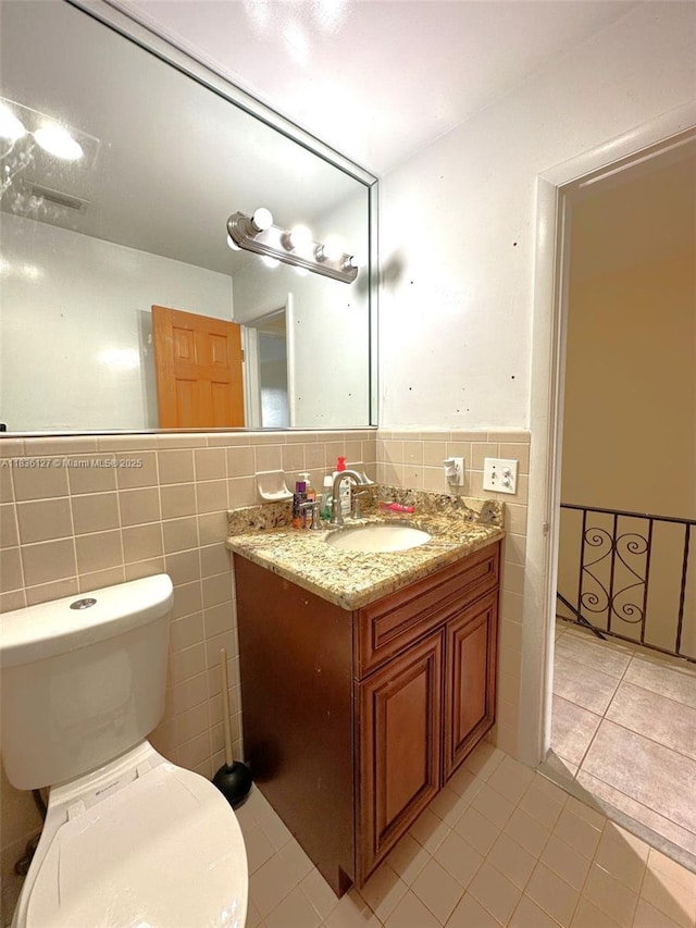 6707 Brookline Dr Unit 6707, Hialeah, FL 33015 - bathroom with tile walls, vanity, tile patterned floors, and a wainscoted wall