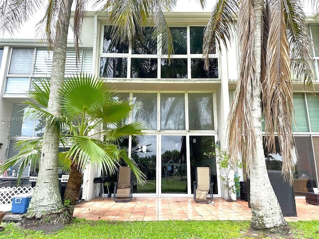 6707 Brookline Dr Unit 6707, Hialeah, FL 33015 - rear view of property featuring a patio