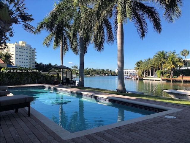 4780 Pine Tree Dr Unit U-2, Miami Beach, FL 33140 - swimming pool with a water view
