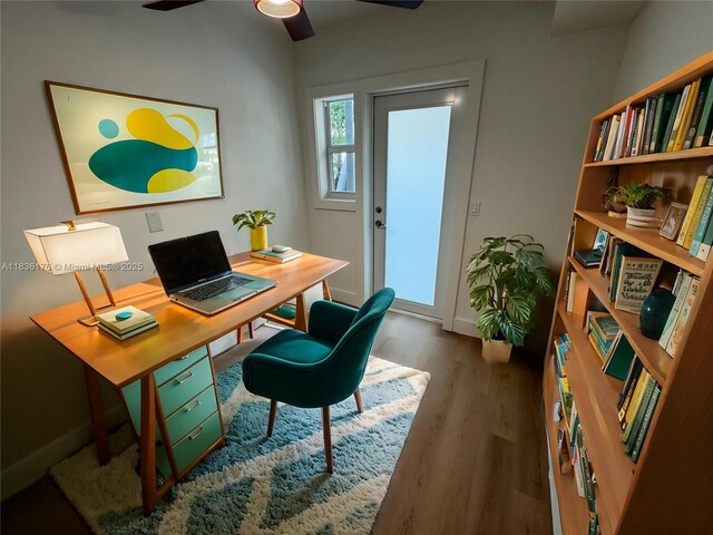 4780 Pine Tree Dr Unit U-2, Miami Beach, FL 33140 - office space with wood finished floors and ceiling fan