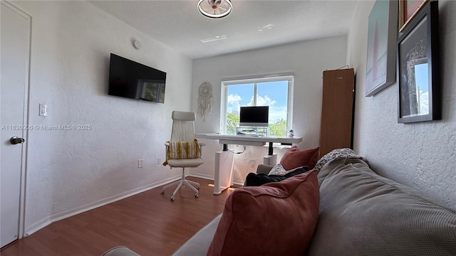 8449 NW 4th Ave Unit 8449, Miami, FL 33150 - living room featuring wood finished floors and a textured wall