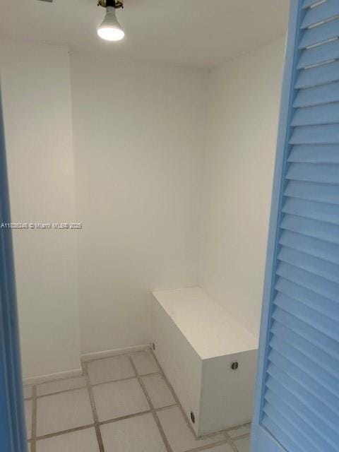 3503 Oaks Way Unit 212, Pompano Beach, FL 33069 - mudroom featuring baseboards