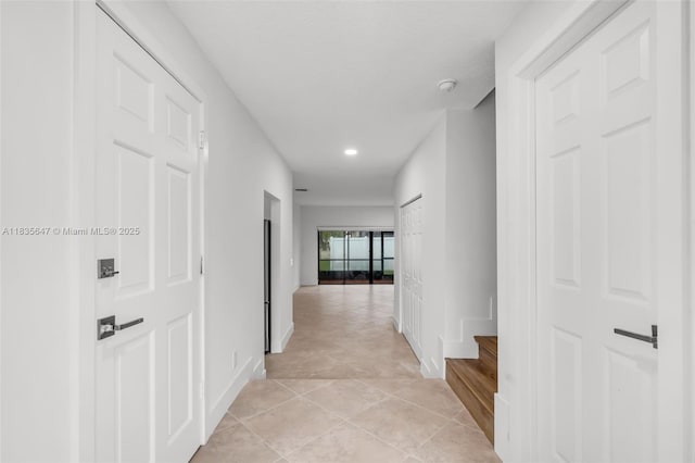 21160 Mainsail Cir Unit H12, Aventura, FL 33180 - hall with recessed lighting, light tile patterned flooring, and stairway