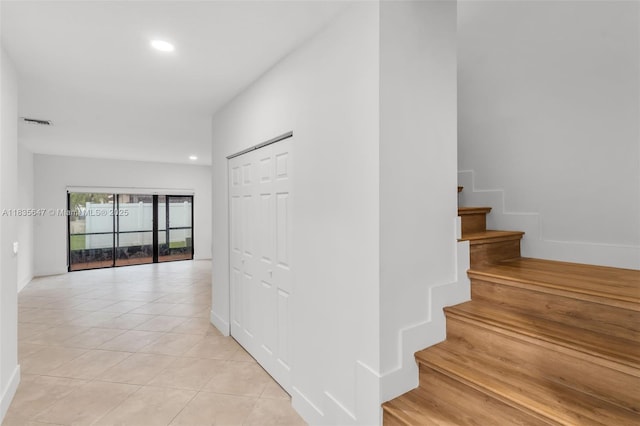 21160 Mainsail Cir Unit H12, Aventura, FL 33180 - staircase featuring recessed lighting and tile patterned floors