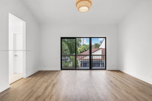 21160 Mainsail Cir Unit H12, Aventura, FL 33180 - unfurnished room with wood finished floors and baseboards