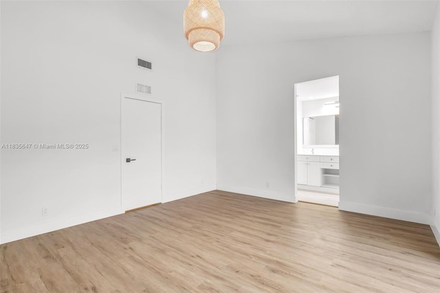 21160 Mainsail Cir Unit H12, Aventura, FL 33180 - unfurnished room with light wood-style flooring and a high ceiling