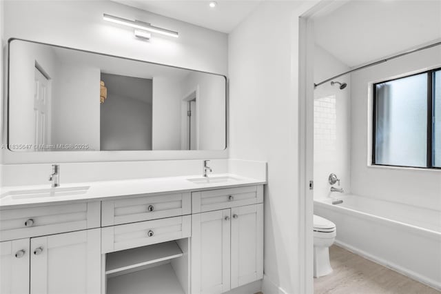 21160 Mainsail Cir Unit H12, Aventura, FL 33180 - bathroom with double vanity, tub / shower combination, and wood finished floors