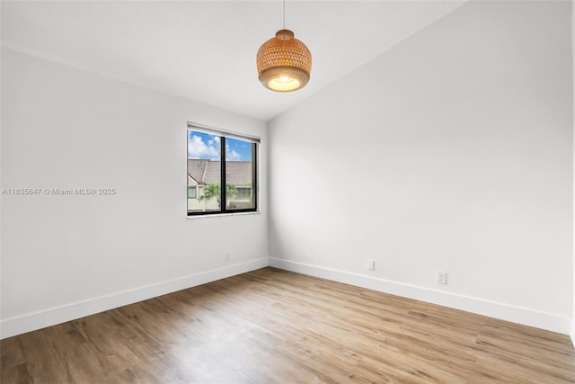 21160 Mainsail Cir Unit H12, Aventura, FL 33180 - unfurnished room featuring light wood finished floors and vaulted ceiling
