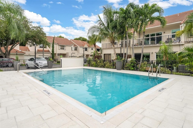 21160 Mainsail Cir Unit H12, Aventura, FL 33180 - community pool featuring a residential view