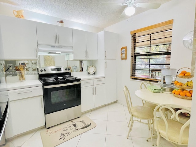 3137 S Carambola Cir S Unit 2369, Coconut Creek, FL 33066 - kitchen with electric stove, under cabinet range hood, ceiling fan, a textured ceiling, and light countertops