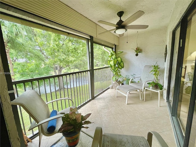 3137 S Carambola Cir S Unit 2369, Coconut Creek, FL 33066 - sunroom / solarium with ceiling fan and a water view