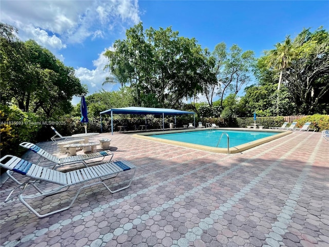 3137 S Carambola Cir S Unit 2369, Coconut Creek, FL 33066 - community pool featuring a patio