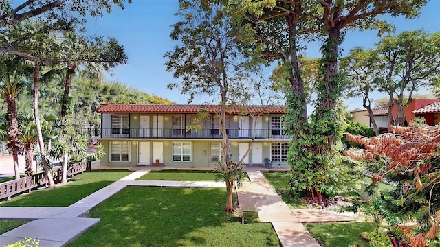 10824 N Kendall Dr Unit S28, Miami, FL 33176 - view of front of property with stucco siding, a front yard, and a tile roof