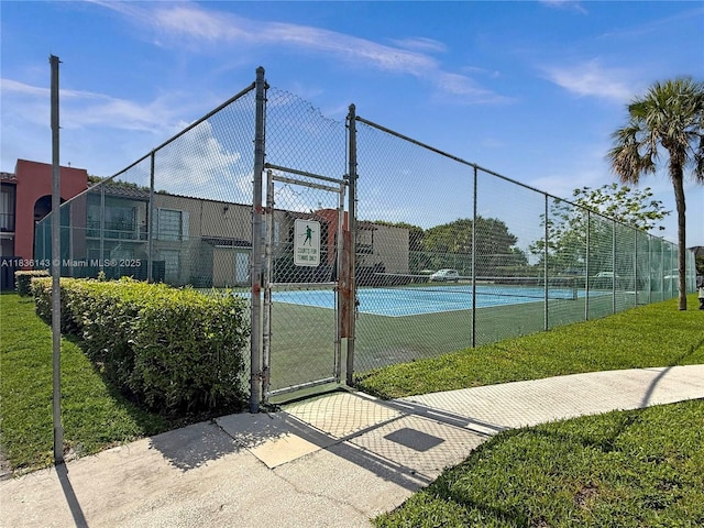 10824 N Kendall Dr Unit S28, Miami, FL 33176 - view of tennis court featuring a gate