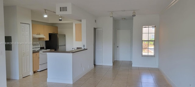2452 Centergate Dr Unit 103, Miramar, FL 33025 - kitchen featuring under cabinet range hood, track lighting, freestanding refrigerator, and electric stove