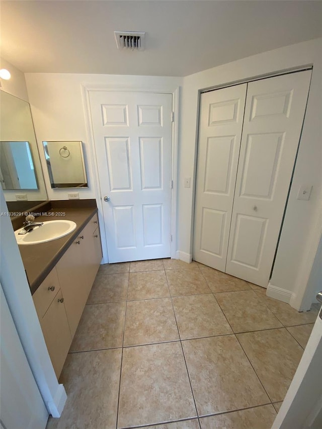 2452 Centergate Dr Unit 103, Miramar, FL 33025 - bathroom featuring vanity and tile patterned flooring