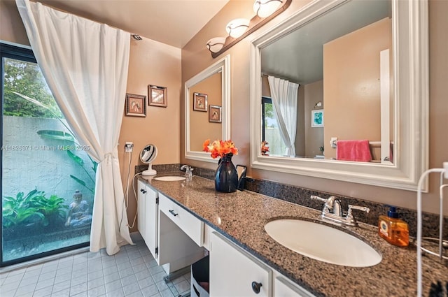 10875 NW 17th Mnr, Coral Springs, FL 33071 - bathroom featuring tile patterned floors and double vanity