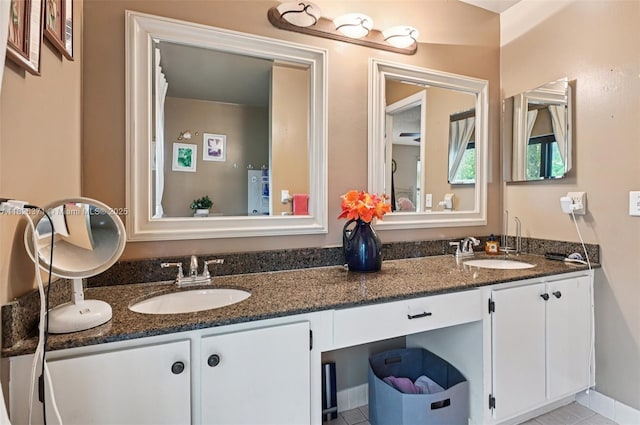 10875 NW 17th Mnr, Coral Springs, FL 33071 - bathroom featuring double vanity and tile patterned floors