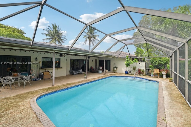 10875 NW 17th Mnr, Coral Springs, FL 33071 - outdoor pool with ceiling fan, a patio, and a lanai
