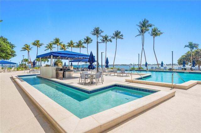 2333 Brickell Ave Unit 1908, Miami, FL 33129 - community pool featuring area for grilling and a patio area