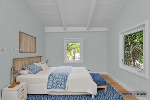 81975 Old Hwy, Islamorada, FL 33036 - bedroom with wood finished floors and wooden ceiling