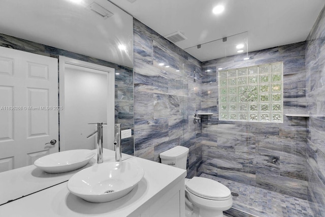 81975 Old Hwy, Islamorada, FL 33036 - full bath with vanity, a walk in shower, and tile walls