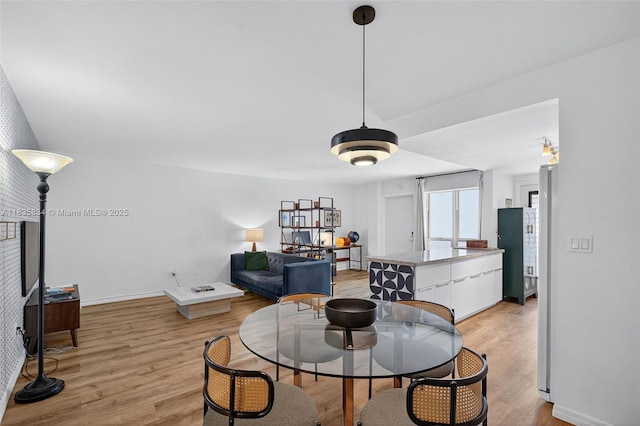 1340 Lincoln Rd Unit 403, Miami Beach, FL 33139 - dining area featuring light wood-style floors and baseboards