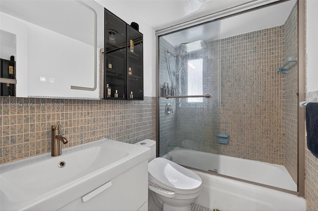 1340 Lincoln Rd Unit 403, Miami Beach, FL 33139 - bathroom featuring tile walls, bathing tub / shower combination, and vanity