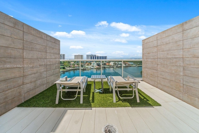 400 Sunny Isles Blvd Unit 616, Sunny Isles Beach, FL 33160 - view of green lawn featuring a water view and a balcony