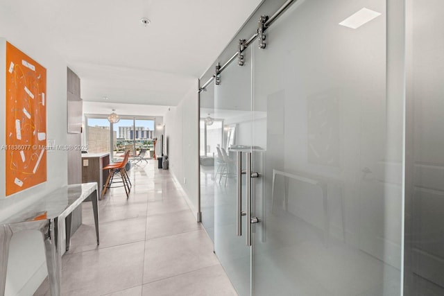 400 Sunny Isles Blvd Unit 616, Sunny Isles Beach, FL 33160 - corridor with light tile patterned floors and baseboards