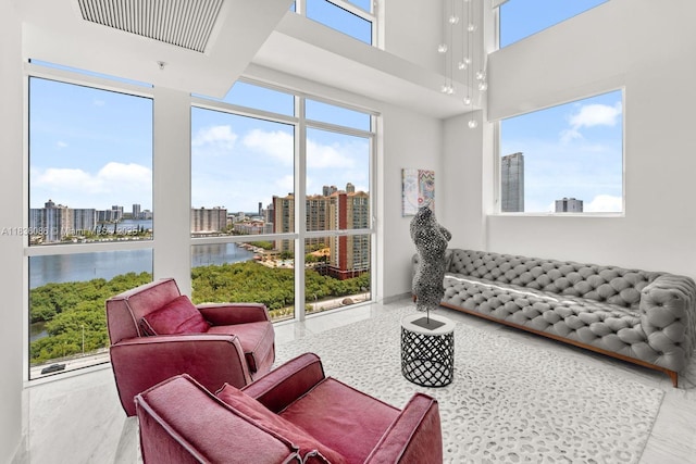 400 Sunny Isles Blvd Unit 2008, Sunny Isles Beach, FL 33160 - living room with a water view, a city view, marble finish floors, and a towering ceiling