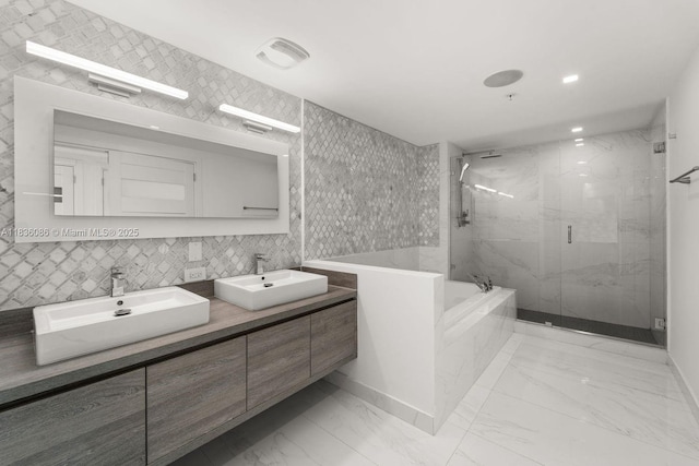 400 Sunny Isles Blvd Unit 2008, Sunny Isles Beach, FL 33160 - full bath featuring a marble finish shower, marble look tiles, a bath, double vanity, and tile walls