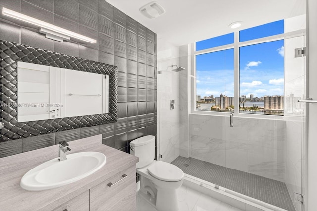 400 Sunny Isles Blvd Unit 2008, Sunny Isles Beach, FL 33160 - bathroom with tile walls, a shower stall, vanity, and a view of city